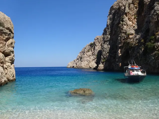Chalki areta beach view with boat