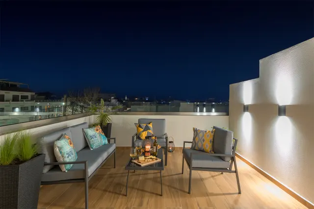 Ilianthos home balcony view and furniture night view from inside