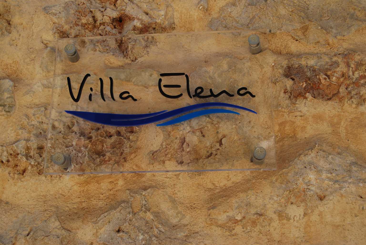 villa elena logo sign on wall