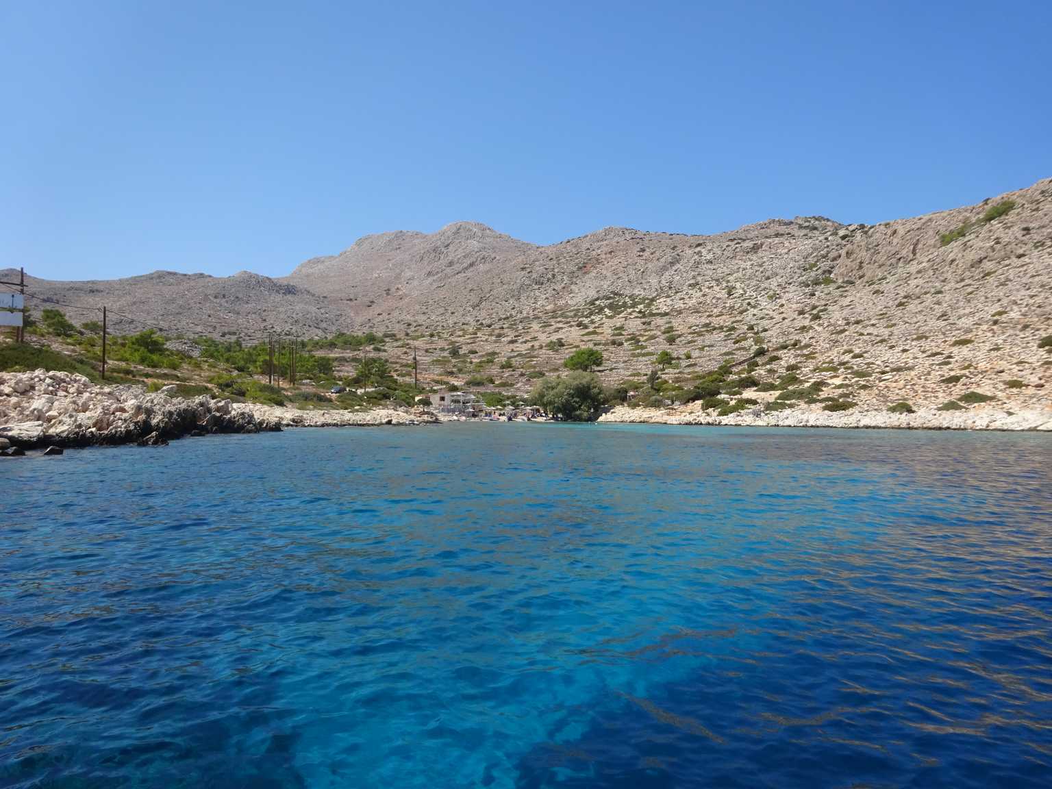 chalki kania beach view when approaching with boat